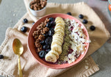 collagen beauty smoothie bowl with berries coconut flakes and edible flowers, glowing skin breakfast smoothie bowl plant based collagen bamboo aloe vera, thick creamy collagen beauty smoothie bowl antioxidant berries