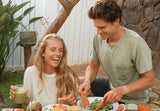 women’s health science research concept, female metabolism vs male metabolism, plant-powered products for female health, woman reading health research, gut health for women image, immunity differences between men and women